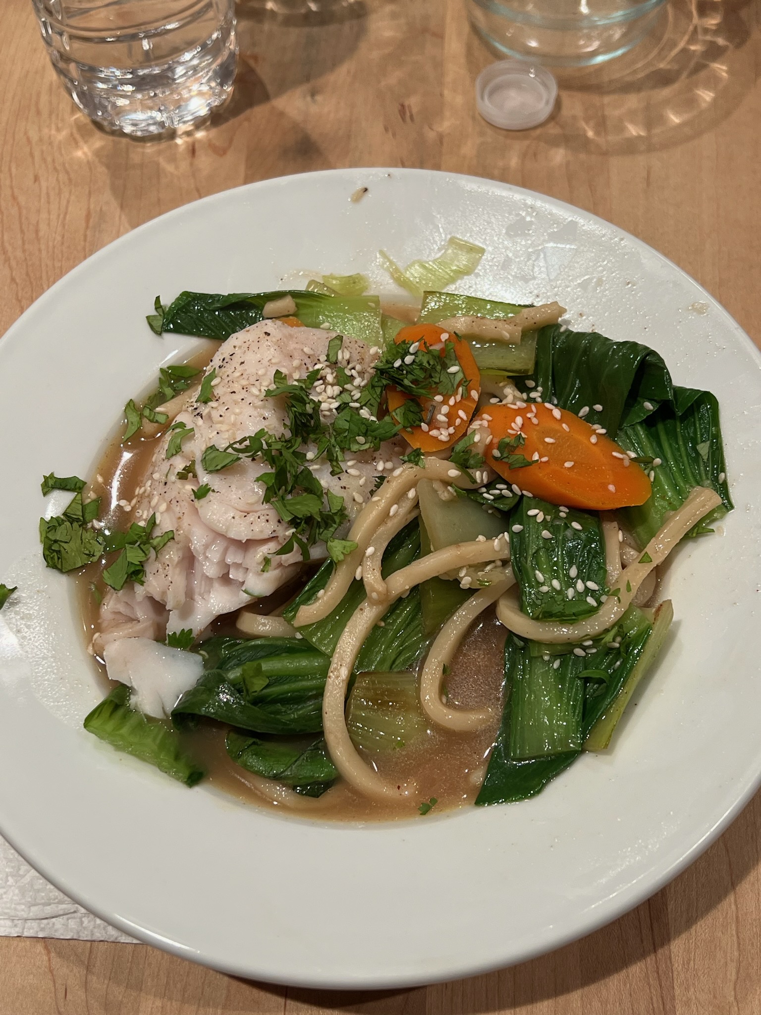 Black Cod Fillets Poached in Five-Spice Broth with Baby Bok Choy and Udon